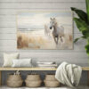Two Horses Walking on the Beach Wall Art - 3x2 Aspect Ratio - Natural Wood Floating Frame Canvas over a Wooden Bench with Jute Baskets and Cozy Pillows