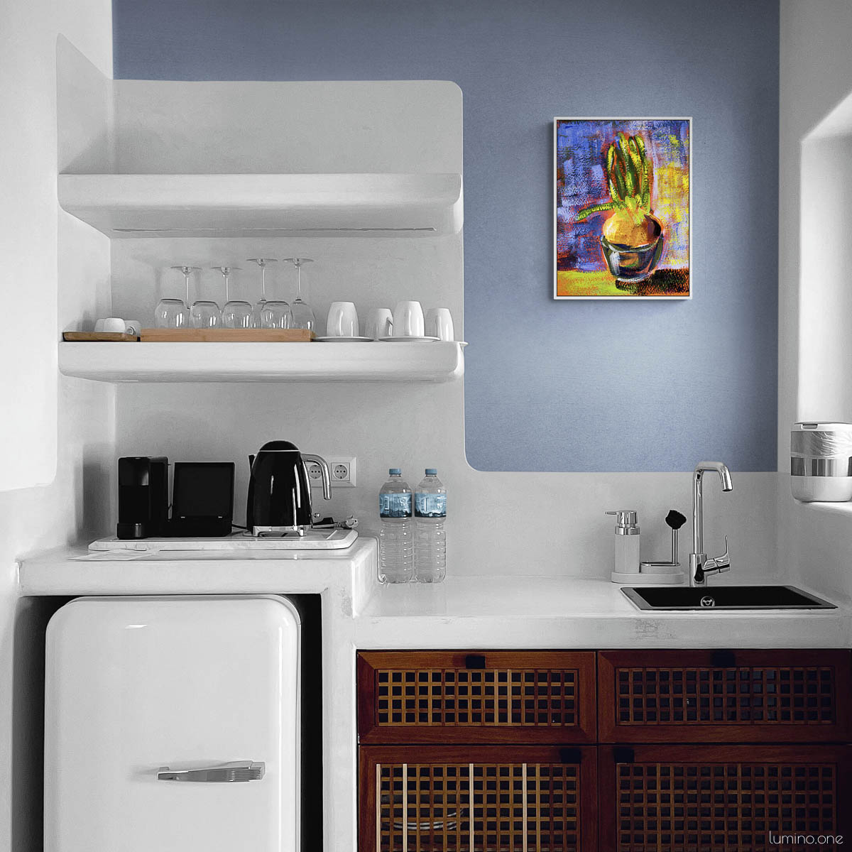 Botanical wall art in white frame displayed on blue accent wall in compact kitchen with white countertops and dark wood cabinets. Impressionist style potted plant painting with vibrant purple and yellow background. Modern kitchenette decor with retro white mini fridge, open shelving, and minimalist design. Perfect for small apartment kitchen, coffee station, or breakfast nook in contemporary or Mediterranean style home.