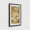 Elegant botanical wall art featuring white dogwood flowers with yellow centers on graceful branches against warm tan background, professionally presented in dark brown wooden frame with crisp white mat. The white matting creates a beautiful contrast that enhances the delicate floral illustration while the simple brown frame adds warmth and sophistication, perfect for modern or traditional interiors.