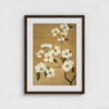 Elegant botanical wall art featuring white dogwood flowers with yellow centers on graceful branches against warm tan background, professionally presented in dark brown wooden frame with crisp white mat. The white matting creates a beautiful contrast that enhances the delicate floral illustration while the simple brown frame adds warmth and sophistication, perfect for modern or traditional interiors.