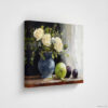 Still life oil painting canvas print featuring white roses in a blue ceramic vase with fresh green apple and dark plums on wooden table, shown as unframed canvas print against white background