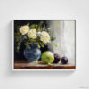 Still life oil painting framed canvas print featuring white roses in a blue ceramic vase with fresh green apple and dark plums on wooden table, displayed in white floating frame against white background