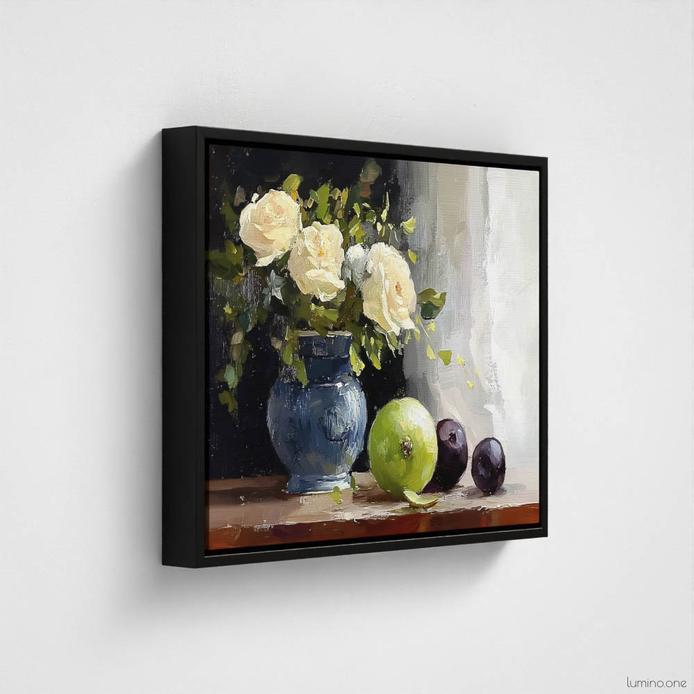 Still life oil painting framed canvas print featuring white roses in a blue ceramic vase with fresh green apple and dark plums on wooden table, displayed in black floating frame against white background