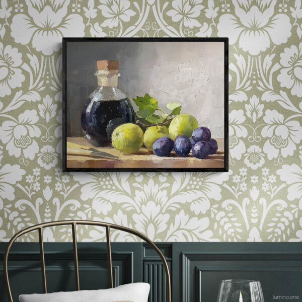 Framed still life oil painting print featuring green grapes, dark wine bottle with cork, and blue grapes arranged on wooden surface, displayed in traditional dining room with sage green floral wallpaper, dark wood wainscoting, and brass chair with round table