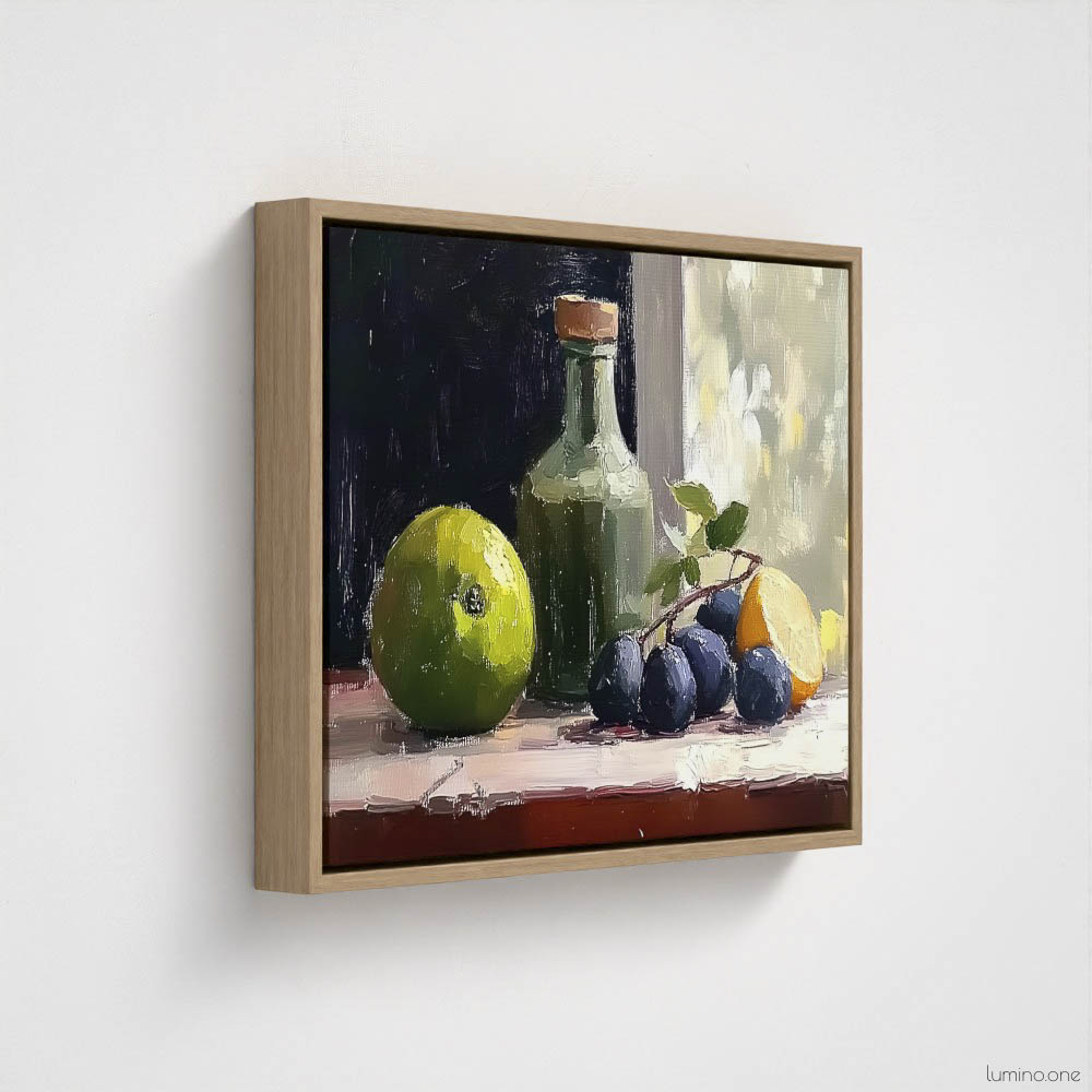 Still life oil painting framed canvas print featuring green apple, dark plums, and green glass bottle with cork arranged on white cloth, displayed in natural wood floating frame against white background